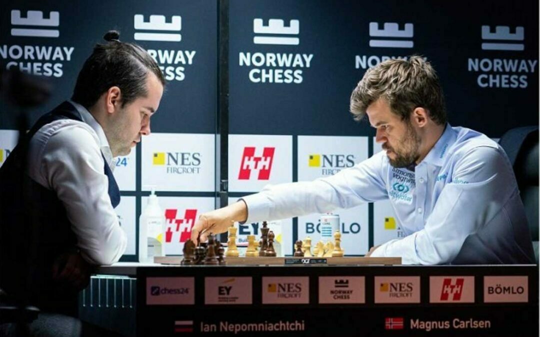 Magnus-Carlsen playing chess with a man
